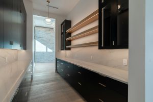 Modern pantry cabinetry with open shelving