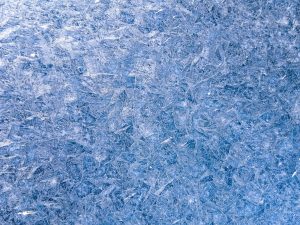 A field of fine blue frost flakes