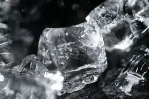 A block of clear ice photographed in black and white
