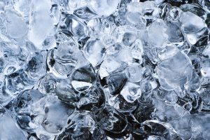 A dense bed of clear ice cubes